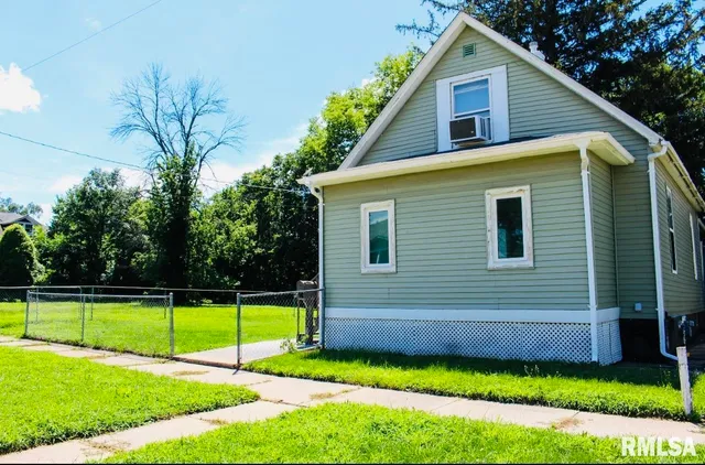 a view of a backyard with a garden