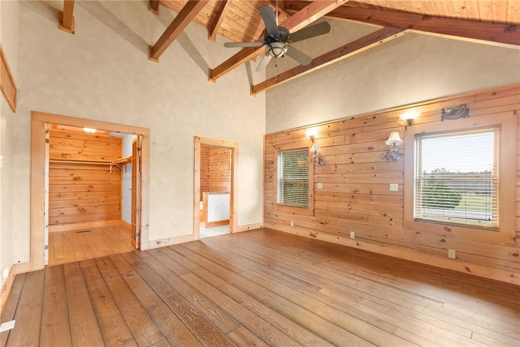 40 Benton Road Jefferson, GA 30549 - Photo 13 of 73 an empty room with wooden floor and windows