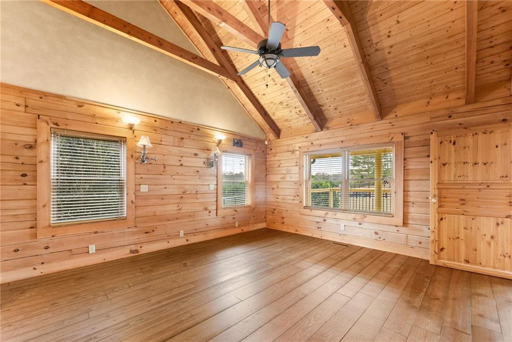 40 Benton Road Jefferson, GA 30549 - Photo 14 of 73 an empty room with wooden floor and windows