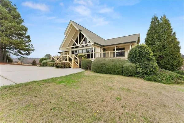 front view of a house with a yard
