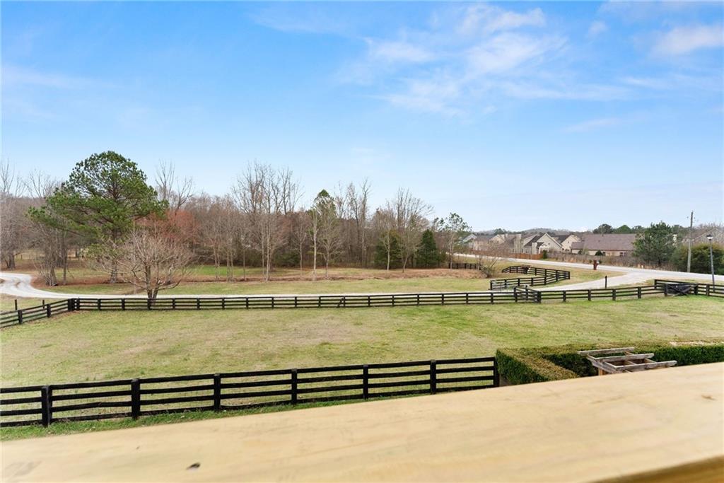 40 Benton Road Jefferson, GA 30549 - Photo 31 of 73 a view of a lake with houses in the background