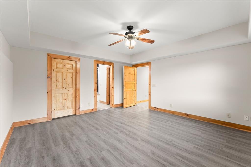 40 Benton Road Jefferson, GA 30549 - Photo 42 of 73 a view of an empty room with wooden floor and a window