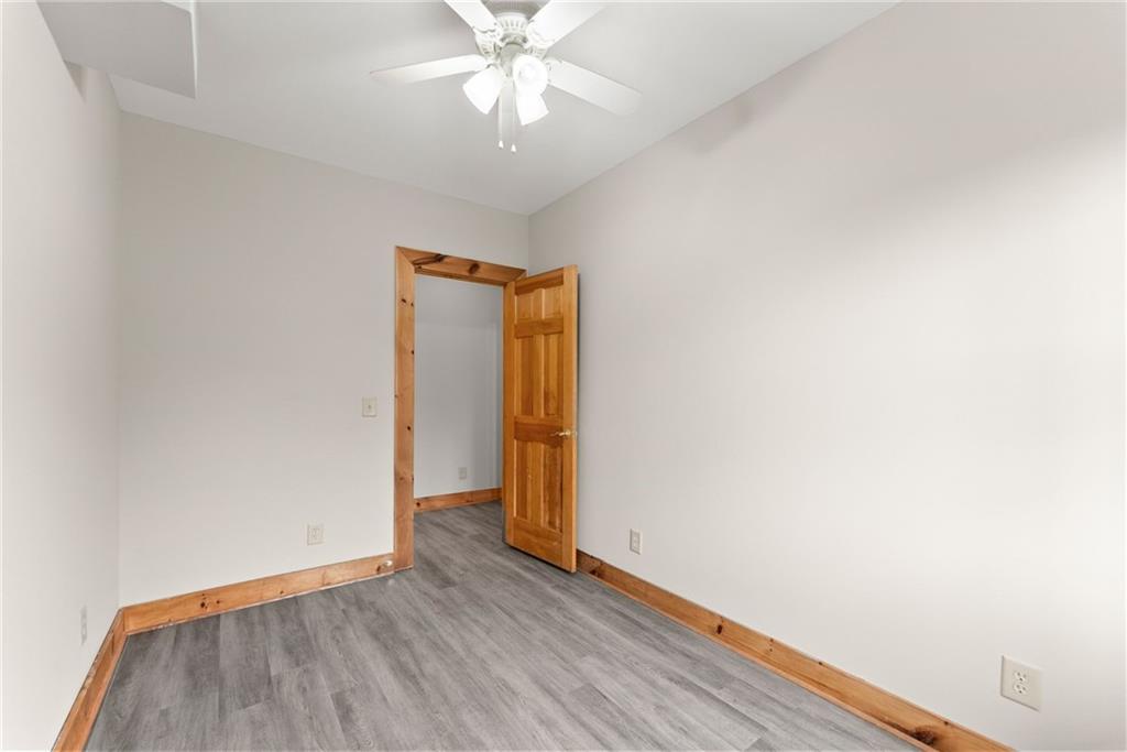 40 Benton Road Jefferson, GA 30549 - Photo 47 of 73 an empty room with wooden floor and closet