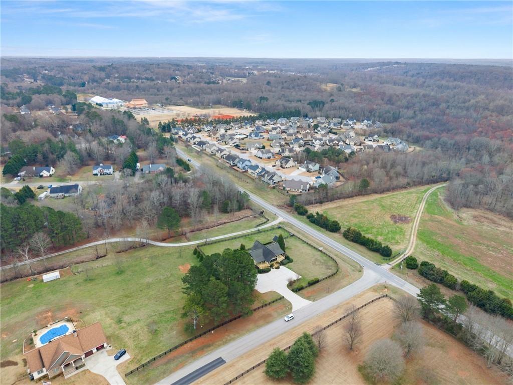 40 Benton Road Jefferson, GA 30549 - Photo 67 of 73 an aerial view of residential houses with outdoor space and trees