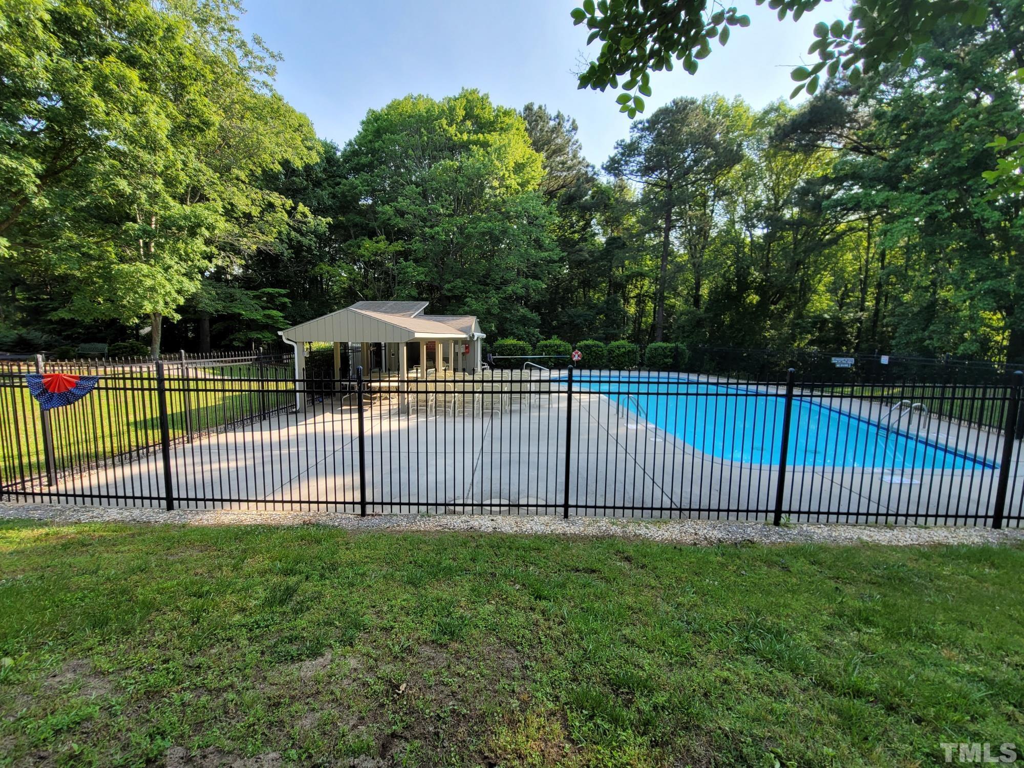 2058 Cedar Circle Sanford, NC 27332 - Photo 3 of 14 a view of a backyard with a garden