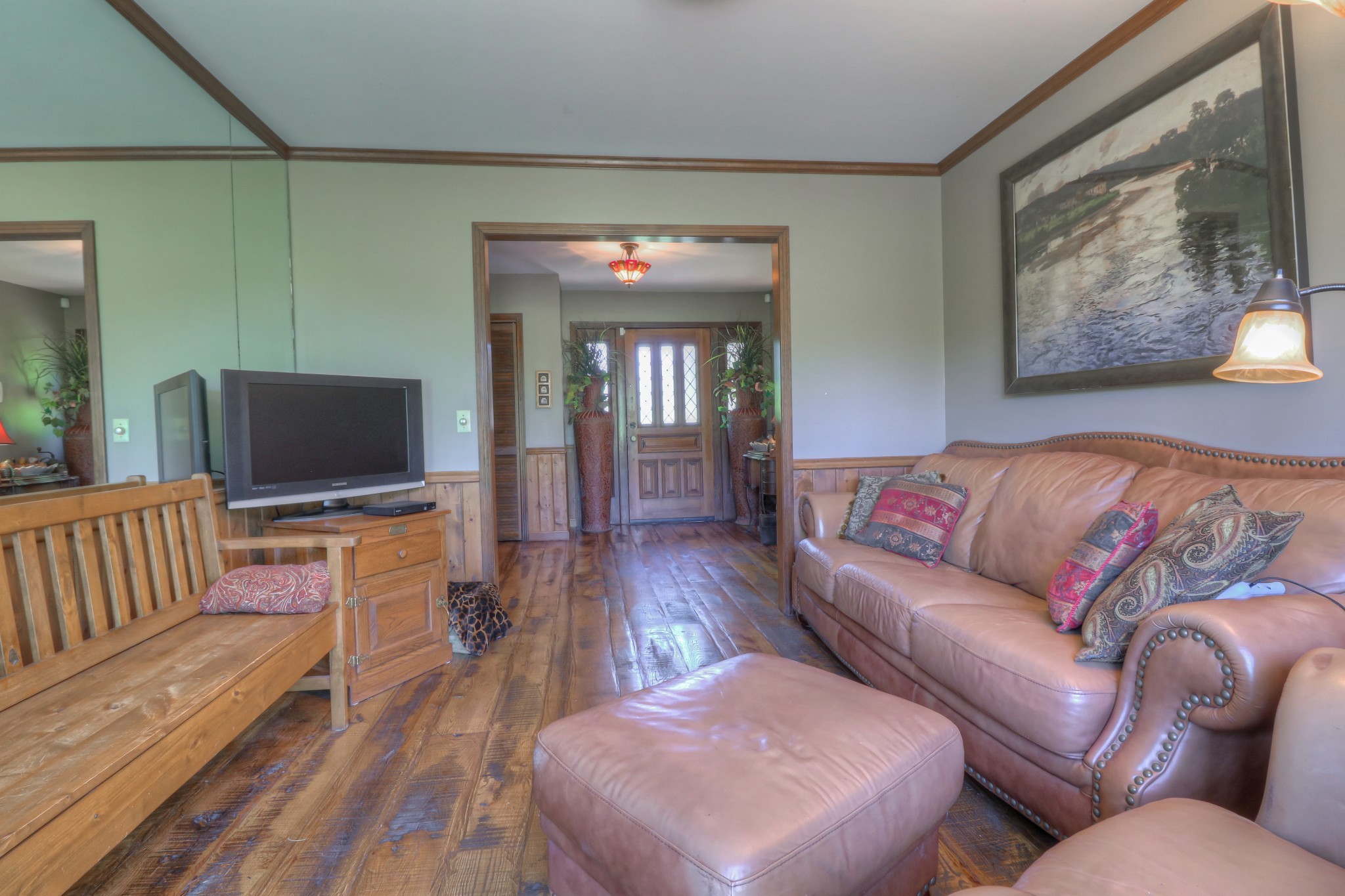 7308 Walker Road Fairview, TN 37062 - Photo 17 of 36 a living room with furniture and a flat screen tv