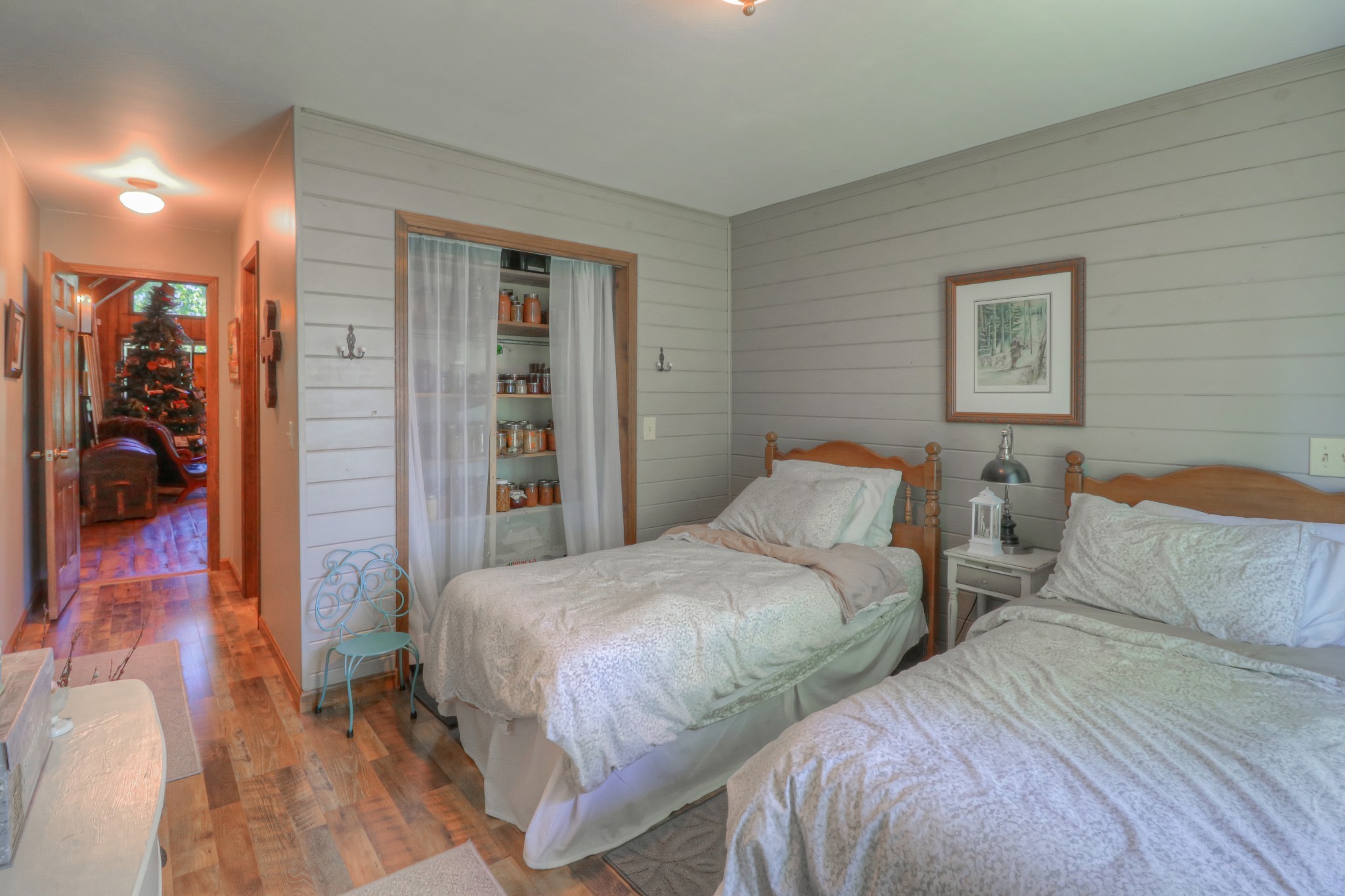 7308 Walker Road Fairview, TN 37062 - Photo 24 of 36 a bedroom with two beds and a walk in closet