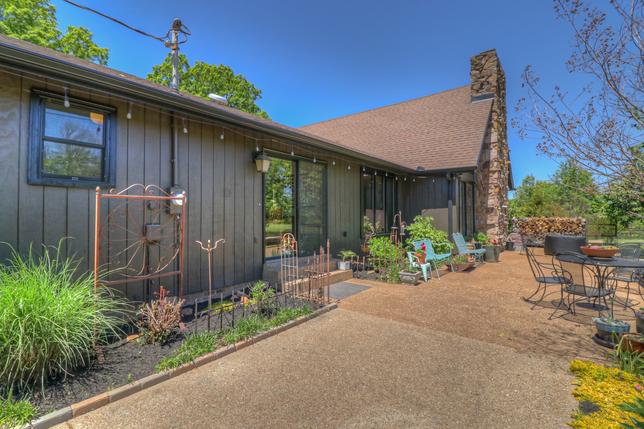 7308 Walker Road Fairview, TN 37062 - Photo 6 of 36 a front view of a house with garden