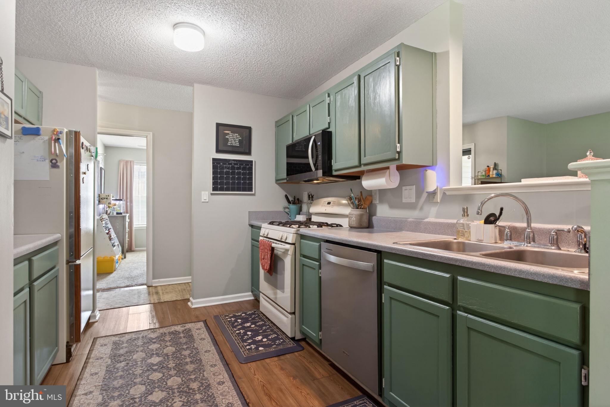 3917 Longhill Station Road Williamsburg, VA 23188 - Photo 12 of 29 Charming kitchen with modern touches.