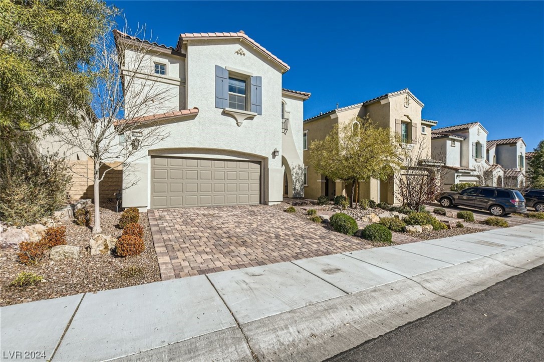 10024 Rams Leap Avenue Las Vegas, NV 89166 - Photo 1 of 51