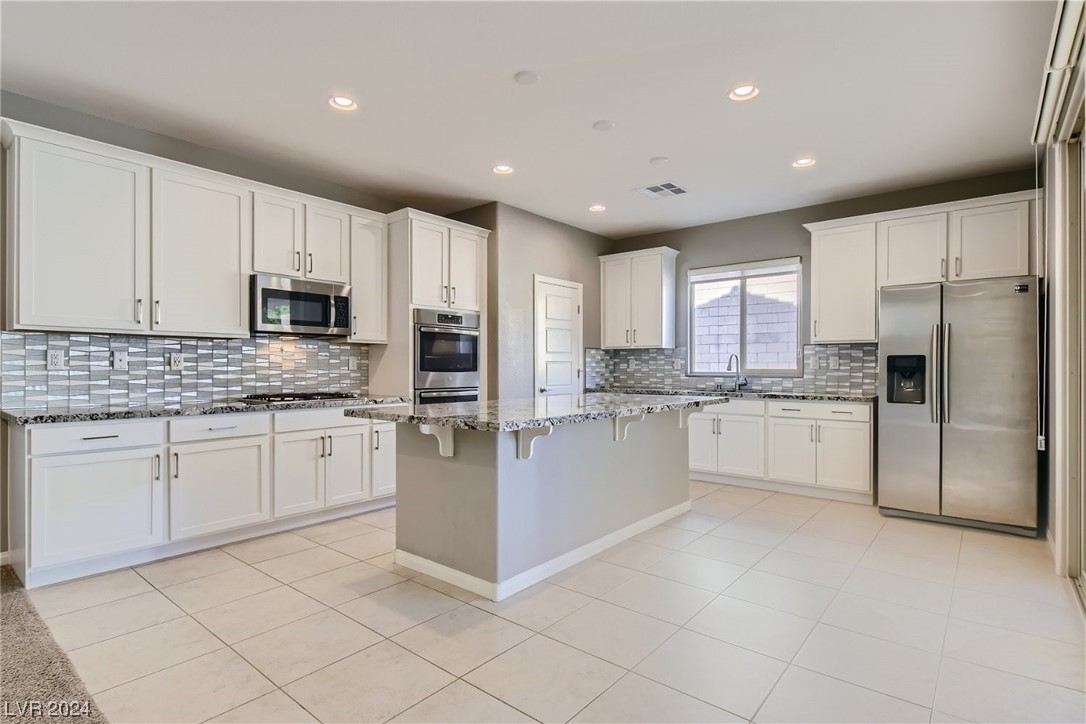 10024 Rams Leap Avenue Las Vegas, NV 89166 - Photo 11 of 51