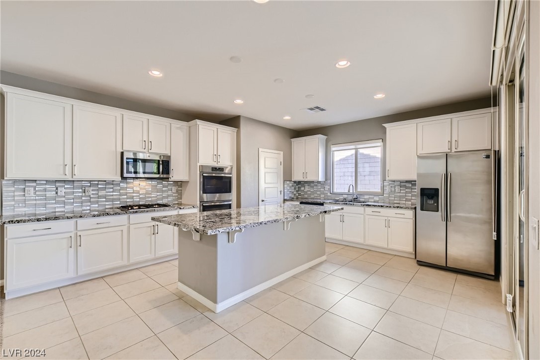 10024 Rams Leap Avenue Las Vegas, NV 89166 - Photo 8 of 51
