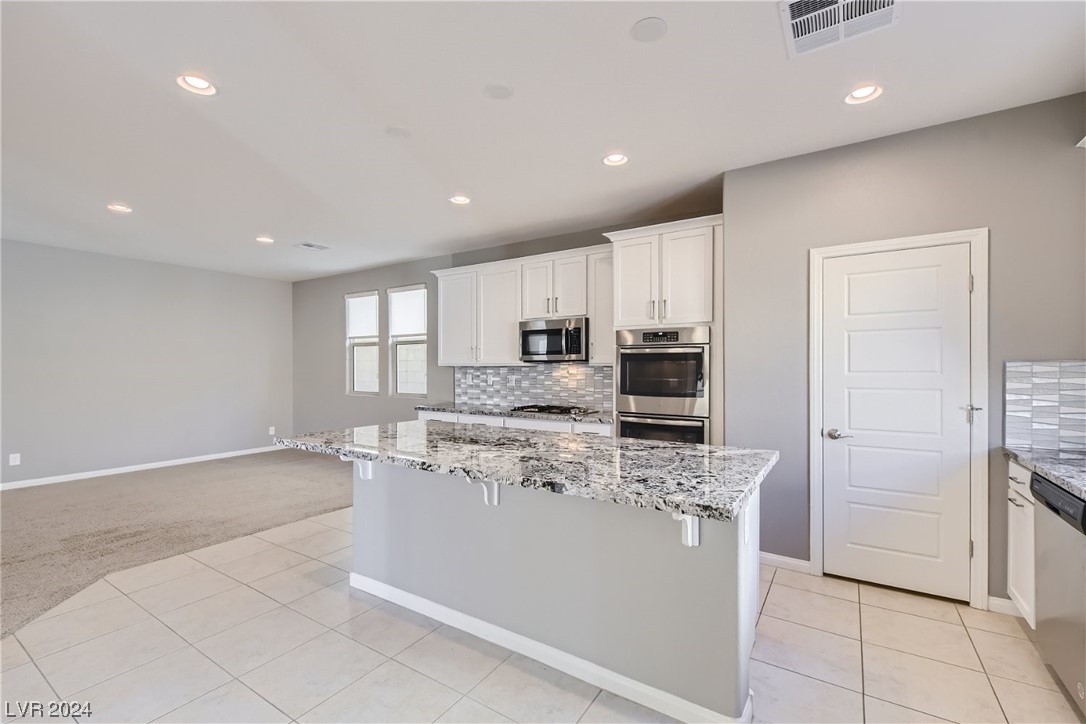 10024 Rams Leap Avenue Las Vegas, NV 89166 - Photo 9 of 51