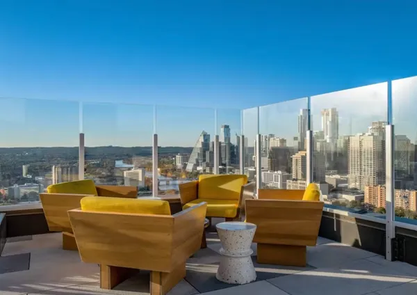 a view of a terrace with furniture