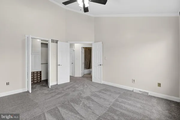 a kitchen with stainless steel appliances a stove a sink and a microwave