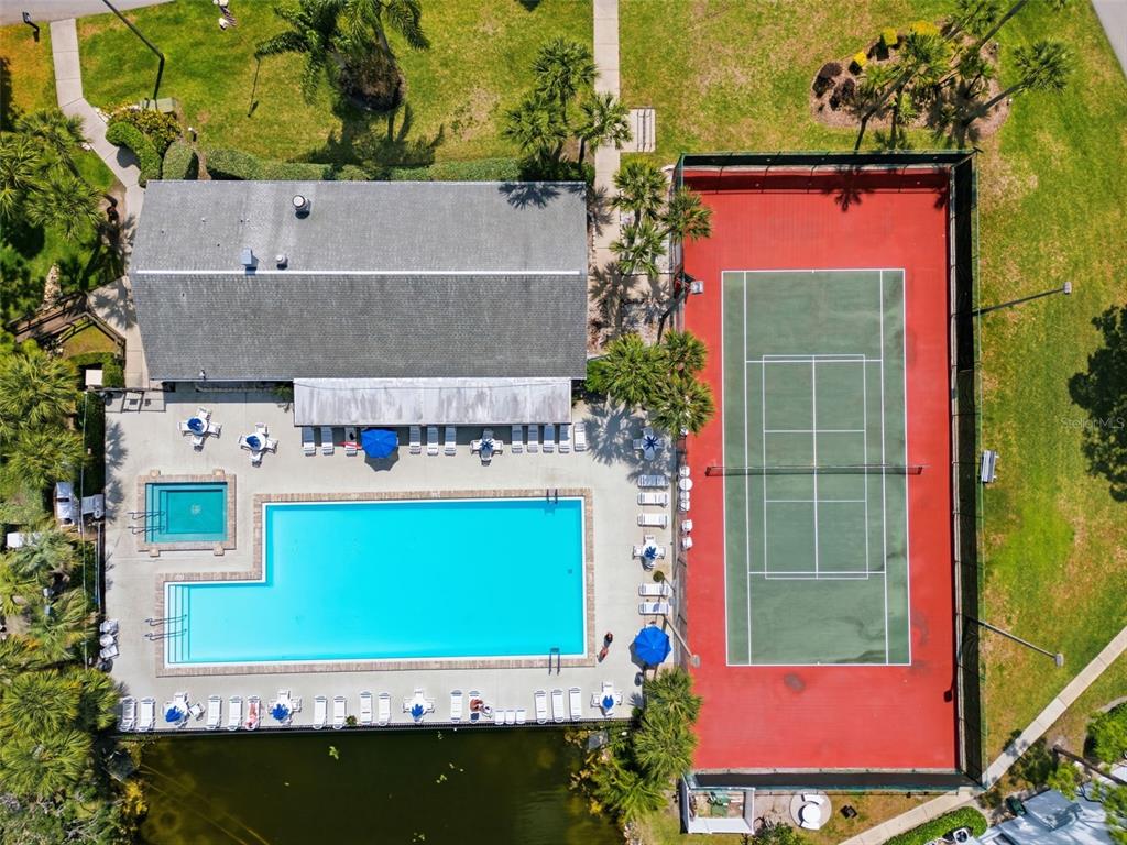 1135 Pine Ridge Circle West, Unit A2 Tarpon Springs, FL 34688 - Photo 58 of 63 an aerial view of a house