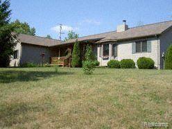 3462 Flint River Road Columbiaville, MI 48421 - Photo 1 of 1 Front of home.