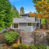 front view of a house with a garden