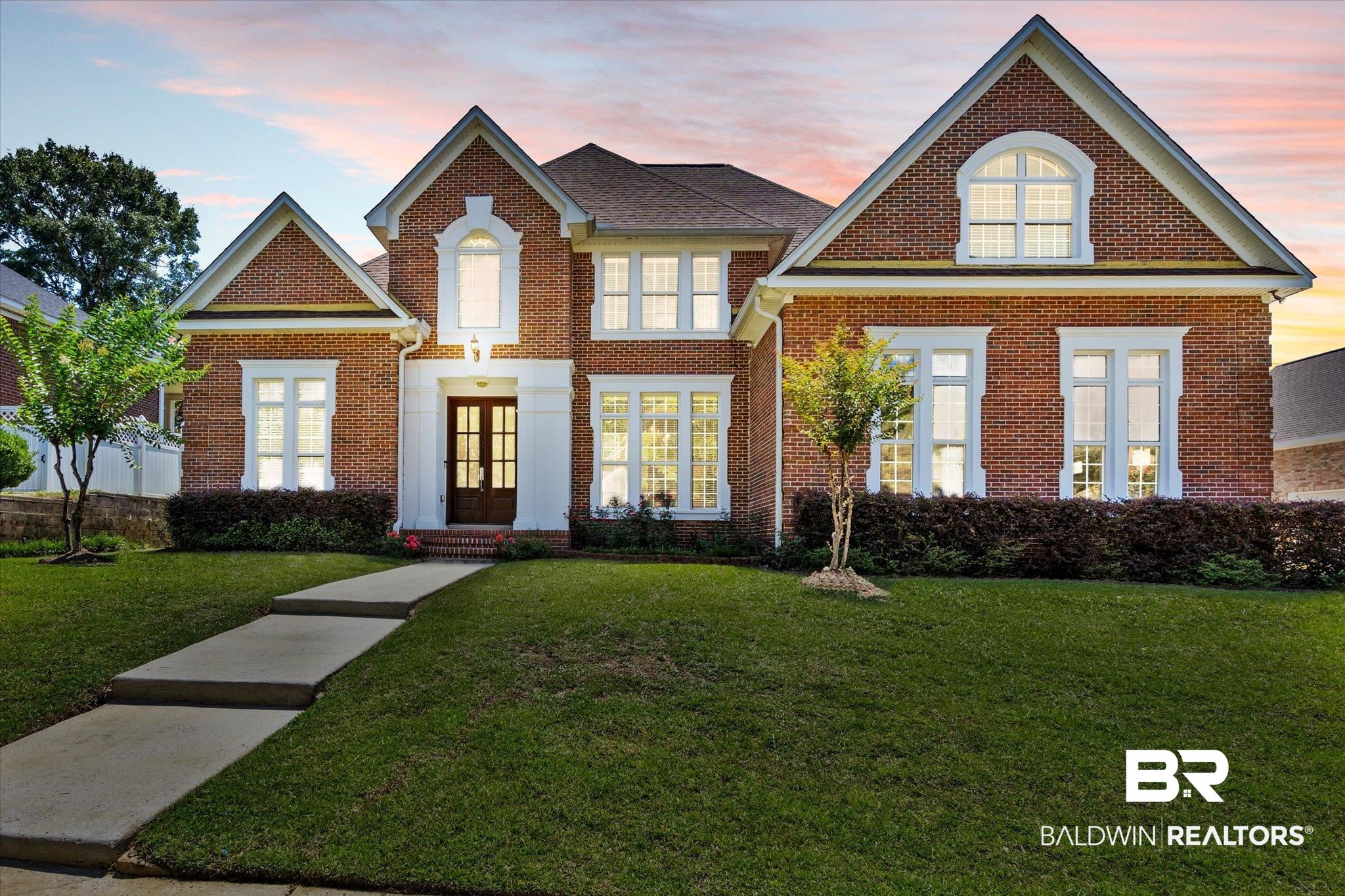 2805 Bennington Drive Mobile, AL 36695 - Photo 34 of 39 View of front facade with a lawn and french doors
