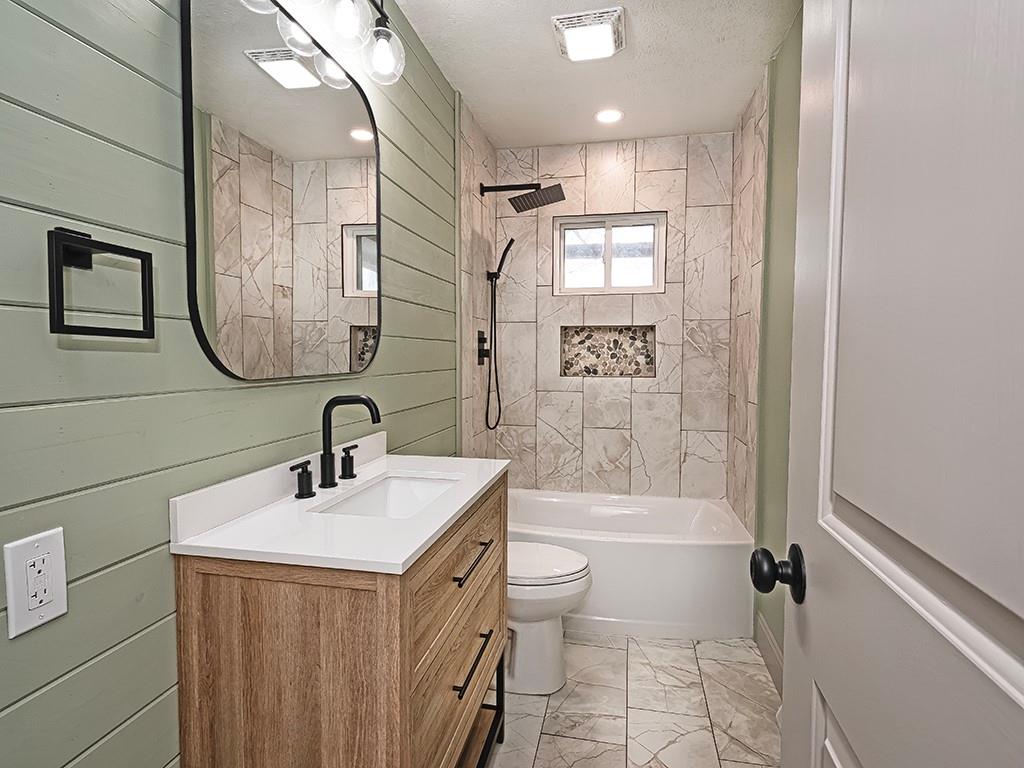 3040 Dutch Ridge Road Beaver, PA 15009 - Photo 21 of 30 a bathroom with a sink a toilet and shower