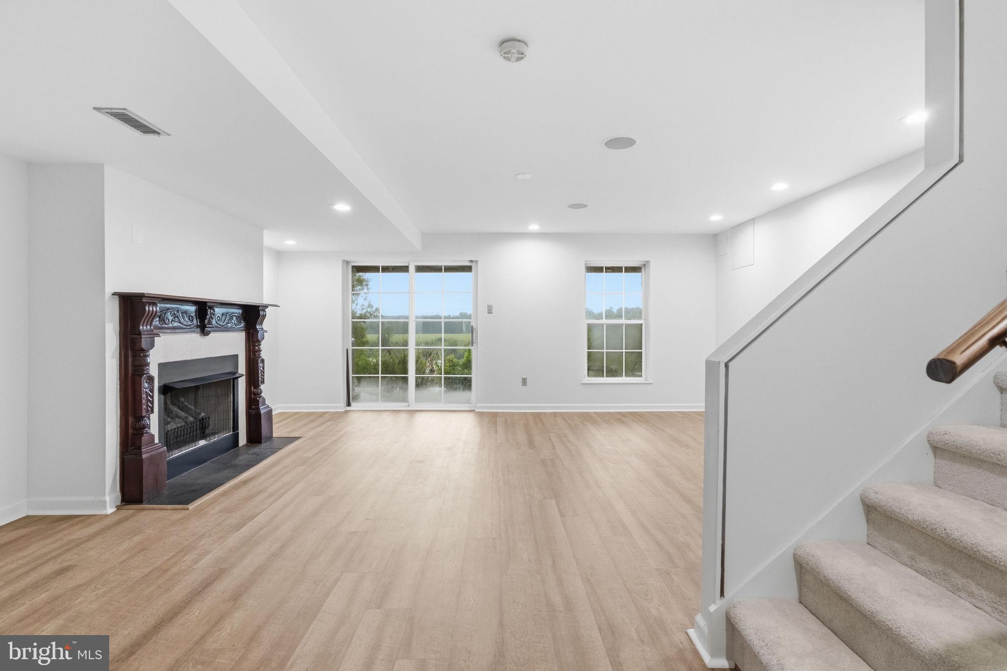 1400 Harbour Ridge Lane Downingtown, PA 19335 - Photo 32 of 36 Lower level with slider to patio