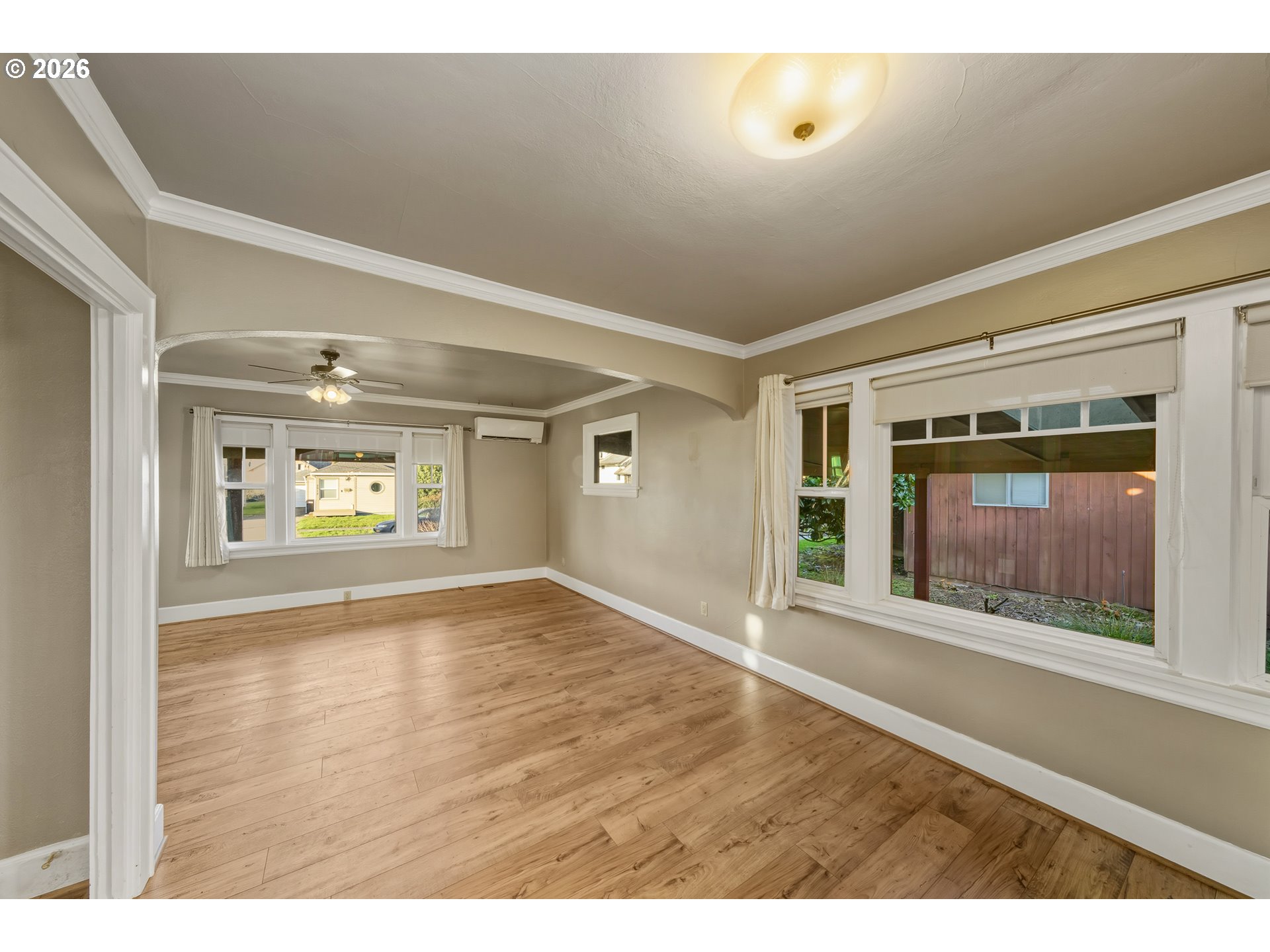 2507 6th Street Tillamook, OR 97141 - Photo 15 of 45 a view of empty room with window and fireplace