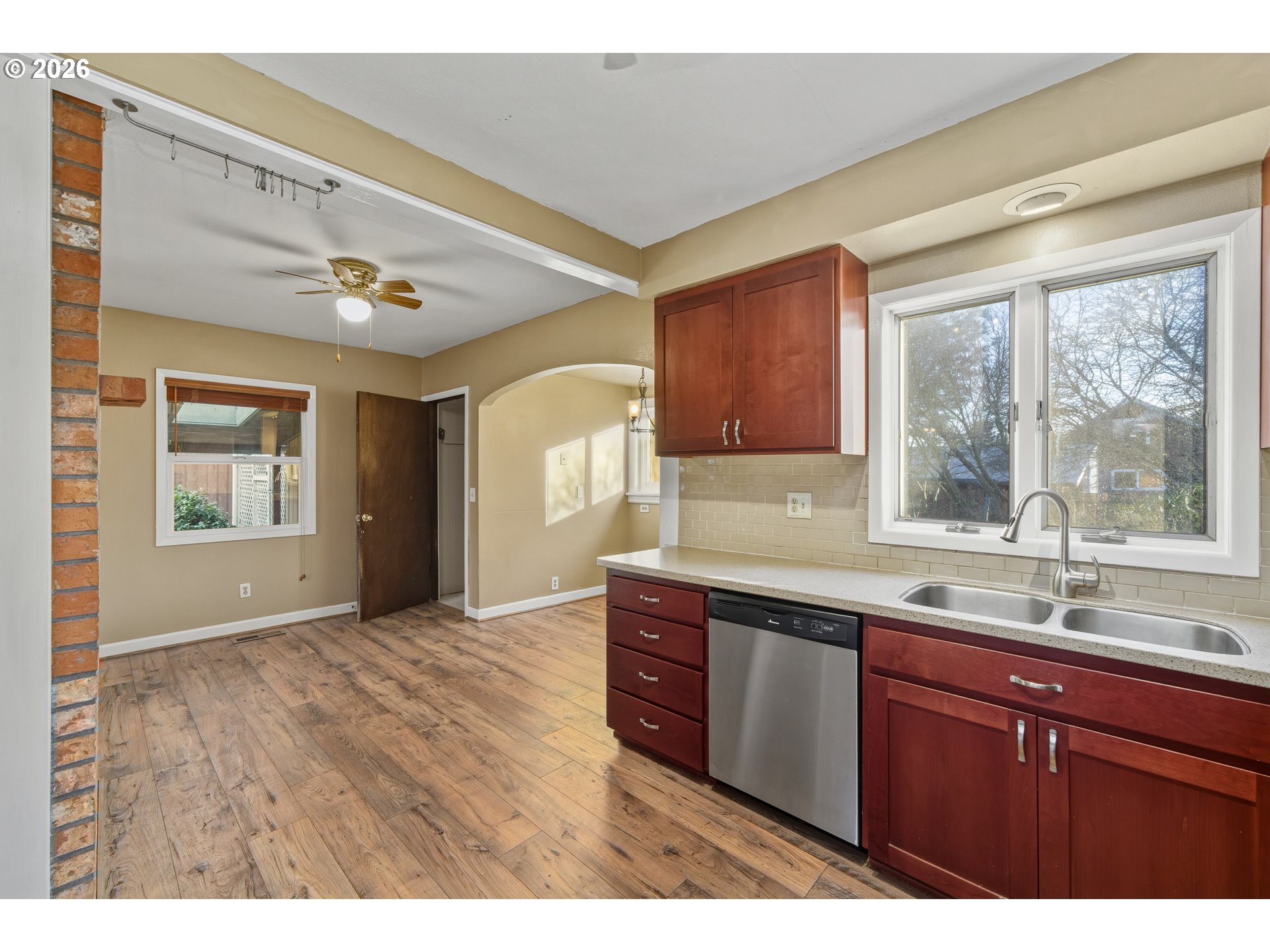 2507 6th Street Tillamook, OR 97141 - Photo 19 of 45 a kitchen with a sink cabinets and window