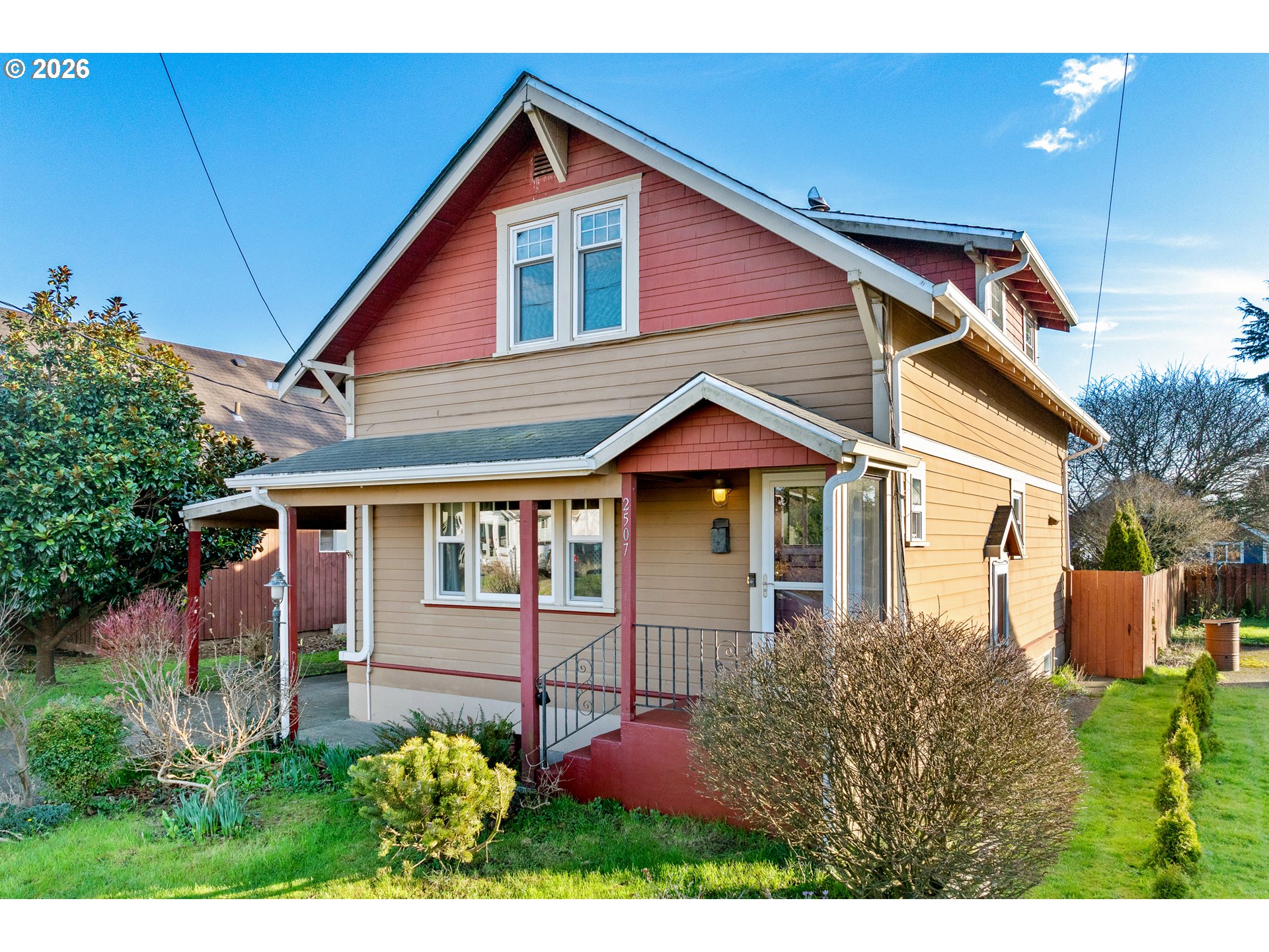 2507 6th Street Tillamook, OR 97141 - Photo 4 of 45 a front view of a house with a yard