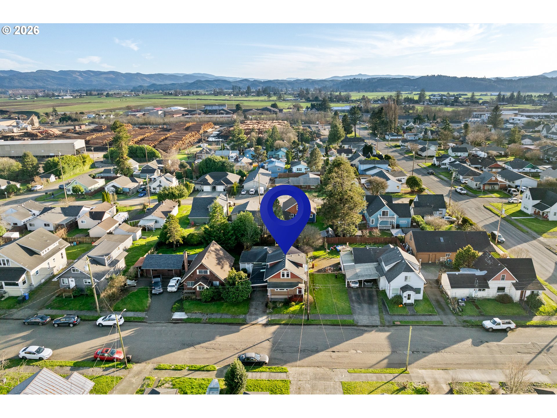 2507 6th Street Tillamook, OR 97141 - Photo 41 of 45 an aerial view of multiple house