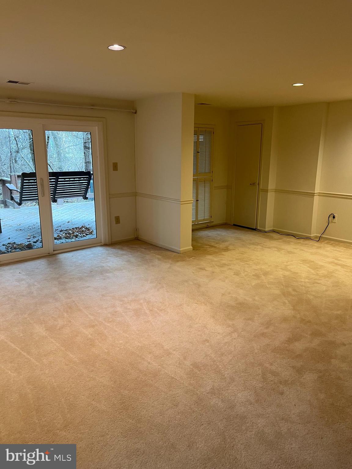 10775 Brewer House Road Rockville, MD 20852 - Photo 13 of 19 an empty room with a fireplace