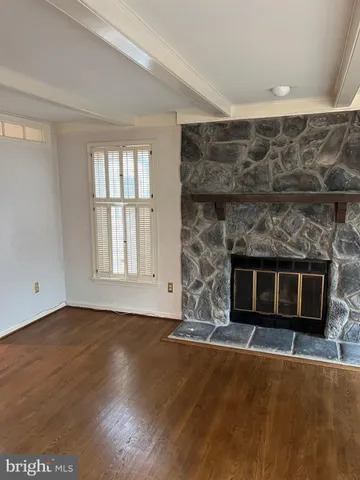 a living room with a fireplace in it