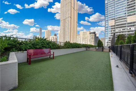 a view of outdoor space with seating area and barbeque oven