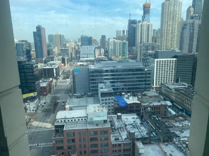 a view of a patio with a yard