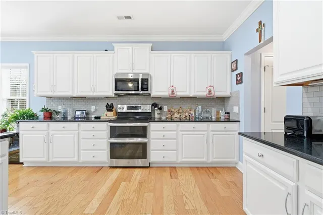 $575,000 | 5770 Highland Grove Drive, Summerfield, NC 27358