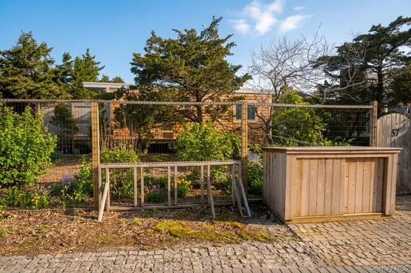 a house view with a backyard