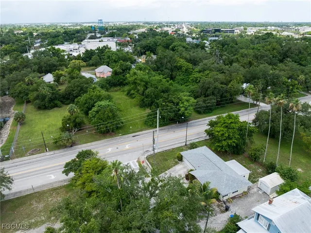 a view of a street with a houses