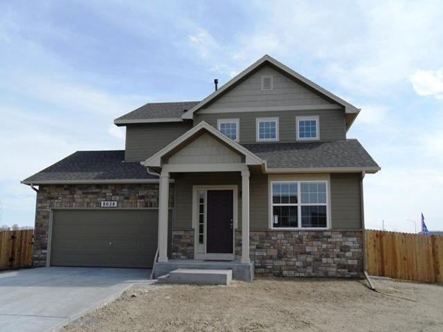 8028 Raspberry Drive Frederick, CO 80504 - Photo 1 of 1 a front view of a house with a garage