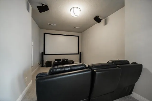 a room with furniture and screen