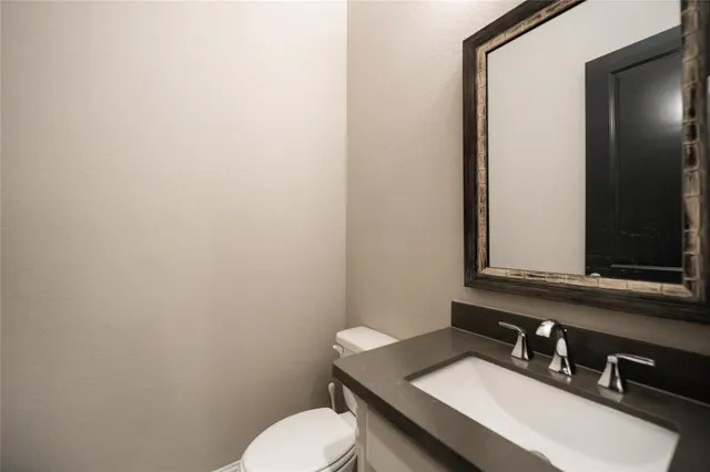 a bathroom with a sink and a toilet