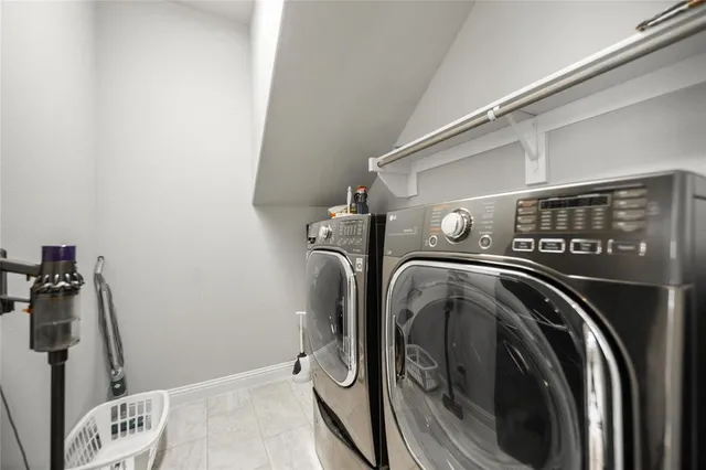 a utility room with dryer and washer