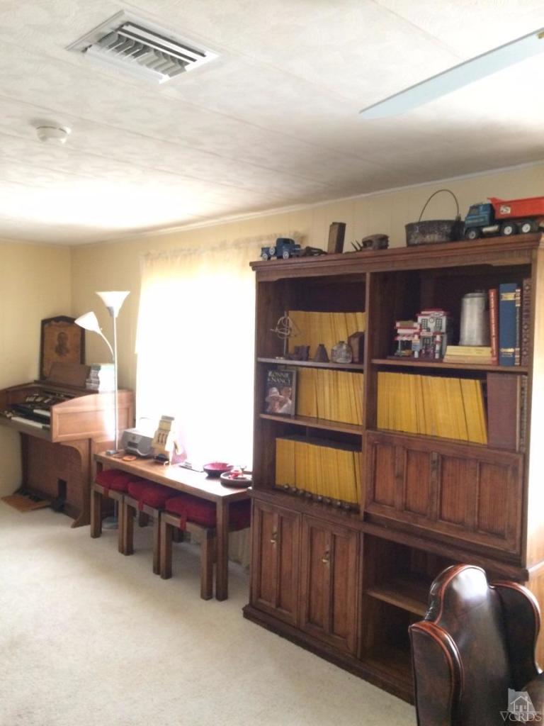 6480 Katherine Road, Unit 83 Simi Valley, CA 93063 - Photo 9 of 9 a room with furniture