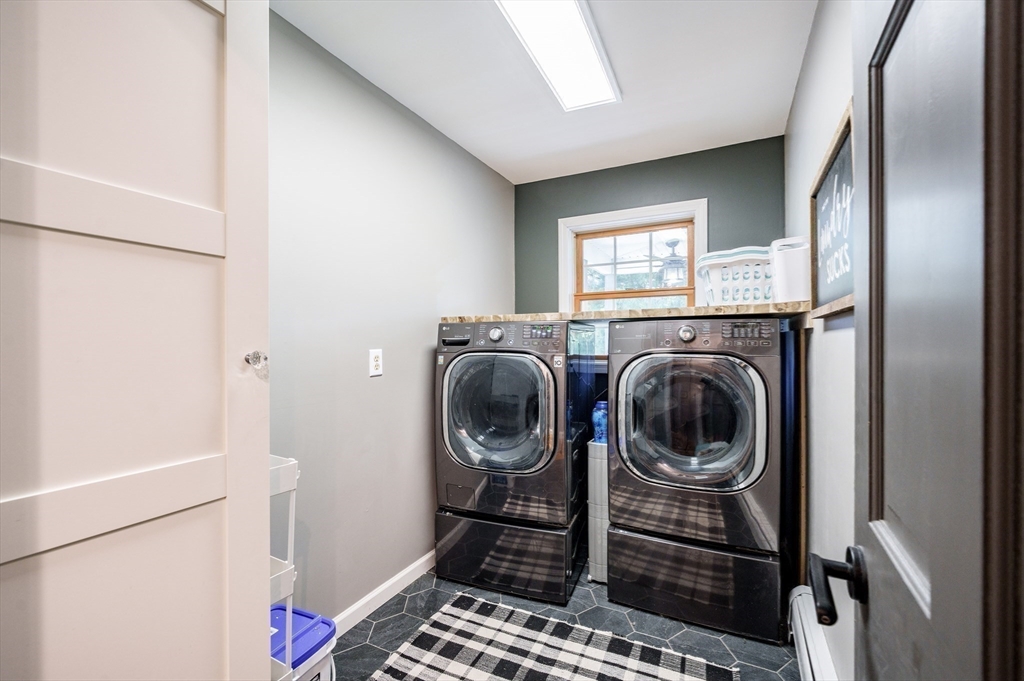 29 Bolles Road Wilbraham, MA 01095 - Photo 16 of 36 a utility room with dryer and washer