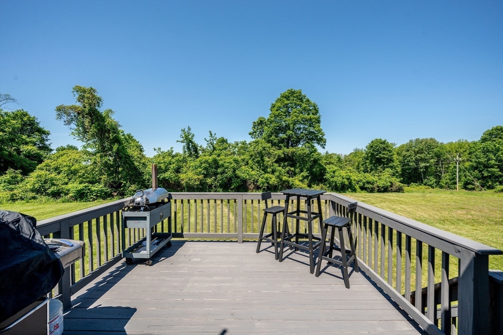 29 Bolles Road Wilbraham, MA 01095 - Photo 27 of 36 a view of balcony with wooden floor and fence
