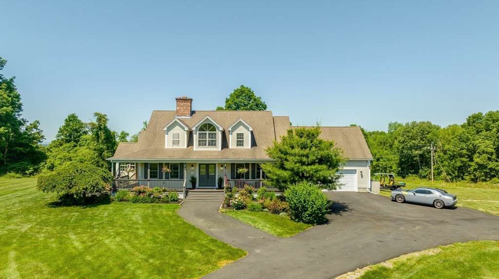 29 Bolles Road Wilbraham, MA 01095 - Photo 32 of 36 a front view of a house with a yard