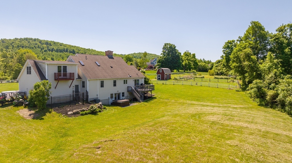 29 Bolles Road Wilbraham, MA 01095 - Photo 33 of 36 a view of a swimming pool with an outdoor space and seating area