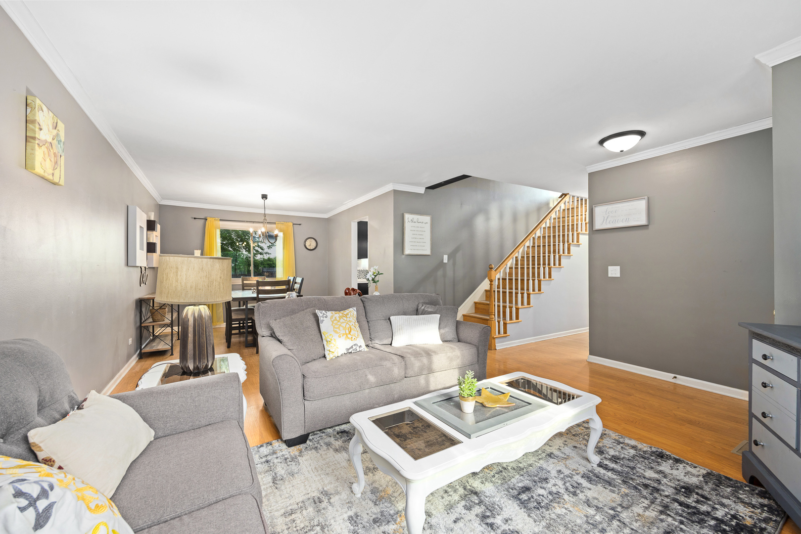 302 Thistle Drive Bolingbrook, IL 60490 - Photo 11 of 33 a living room with furniture and wooden floor