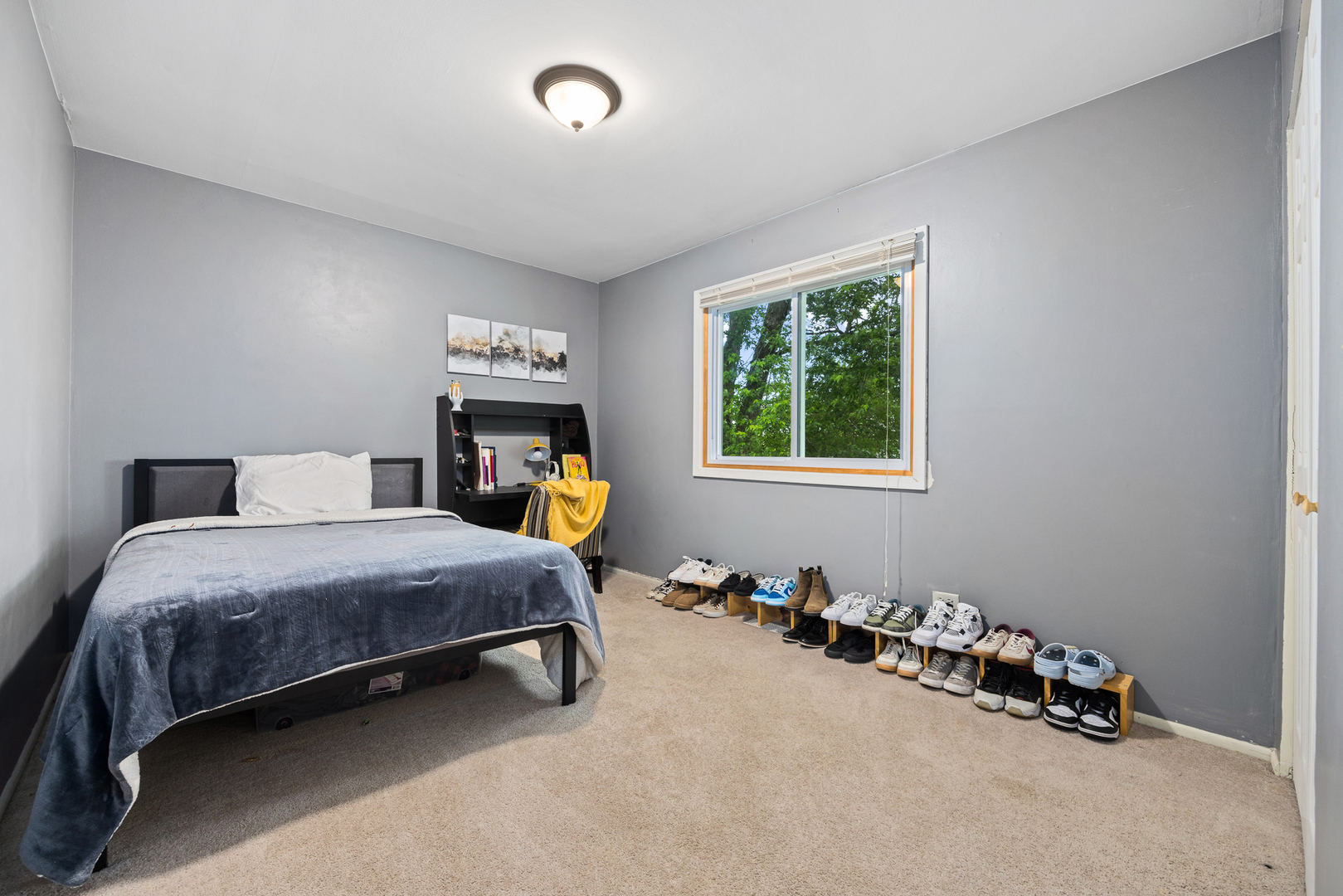 302 Thistle Drive Bolingbrook, IL 60490 - Photo 14 of 33 a bedroom with a bed and a window