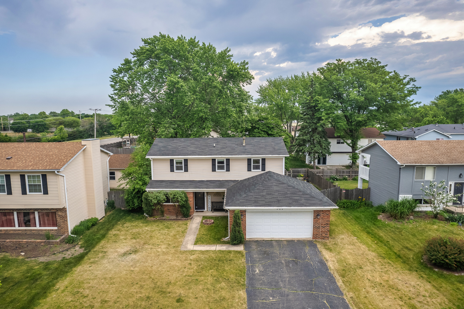 302 Thistle Drive Bolingbrook, IL 60490 - Photo 22 of 33 a aerial view of a house next to a yard