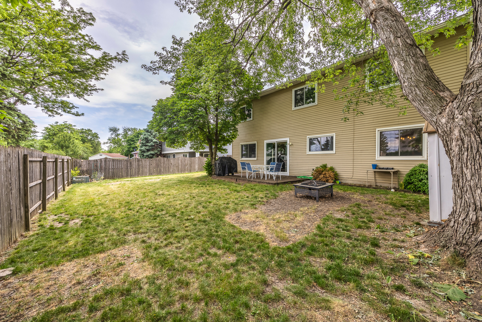 302 Thistle Drive Bolingbrook, IL 60490 - Photo 27 of 33 a backyard of a house with seating space
