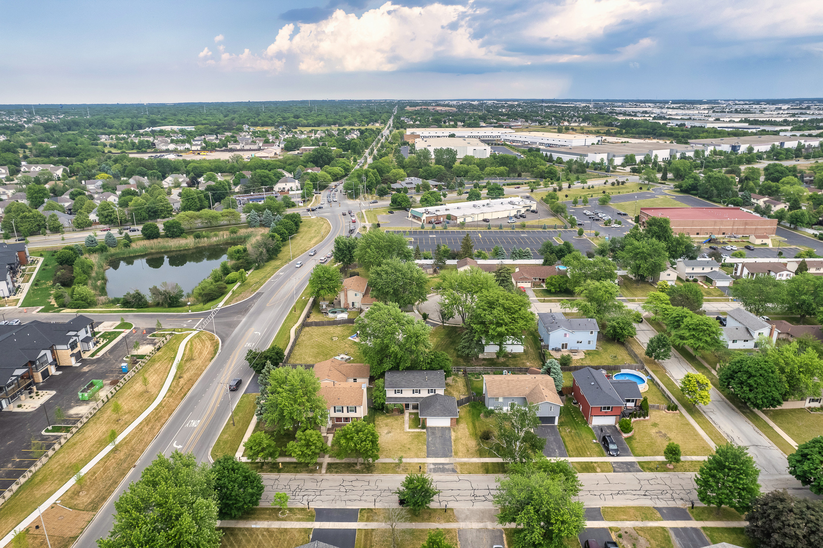 302 Thistle Drive Bolingbrook, IL 60490 - Photo 29 of 33 an aerial view of residential building and lake